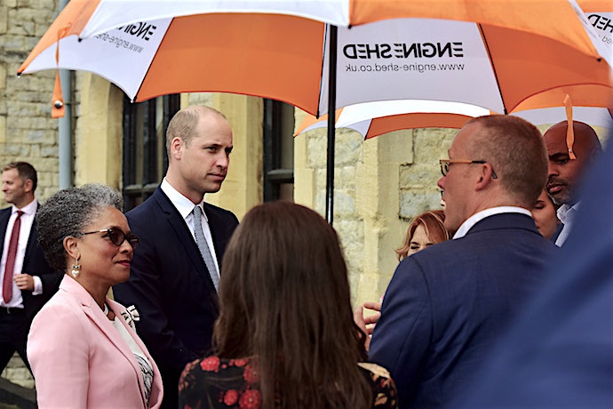 HRH, escorted by Peaches Golding, arrives at the launch venue