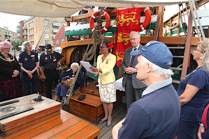 Lord-Lieutenant Peaches Golding OBE reads Her Majesty's certificate prior to The Duke presenting The Queen's Award for Voluntary Service to The Matthew of Bristol Trust